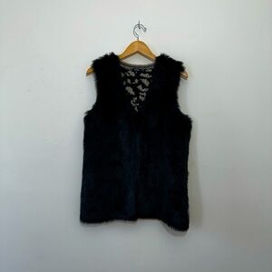 Xoxo || Woman’s Faux black fur vest and knit animal print on the back size Large